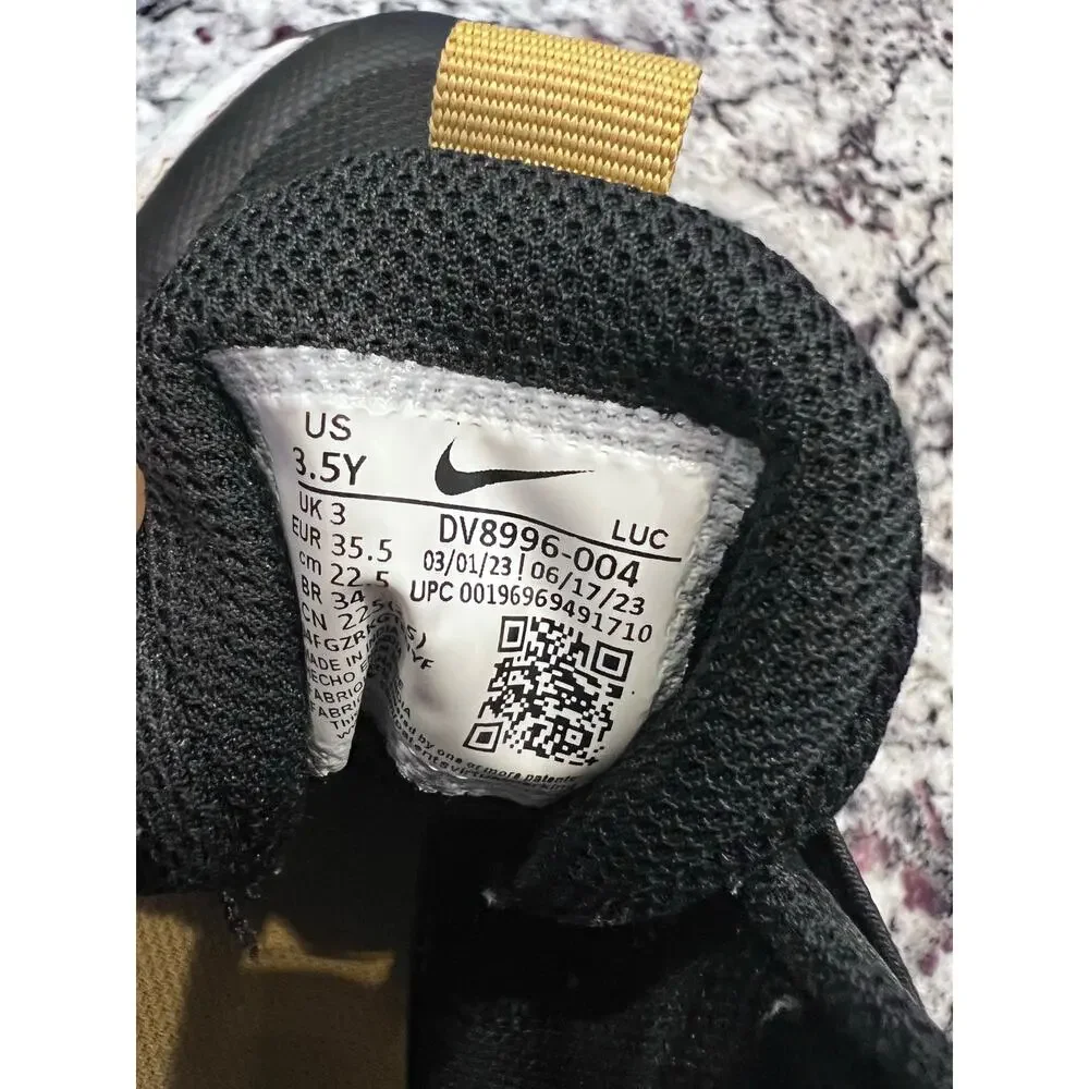 Nike team hustle youth shoes 3.5 black gold white